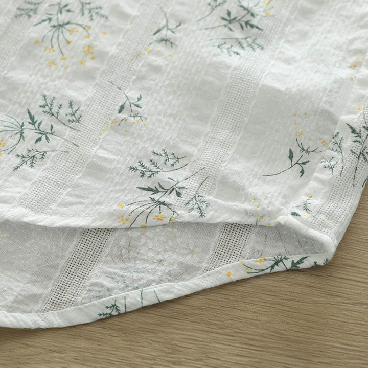 Camisa de manga larga de algodón para mujer con estampado de Buddha Stones, flores blancas y amarillas, hojas verdes y botones. - image 9