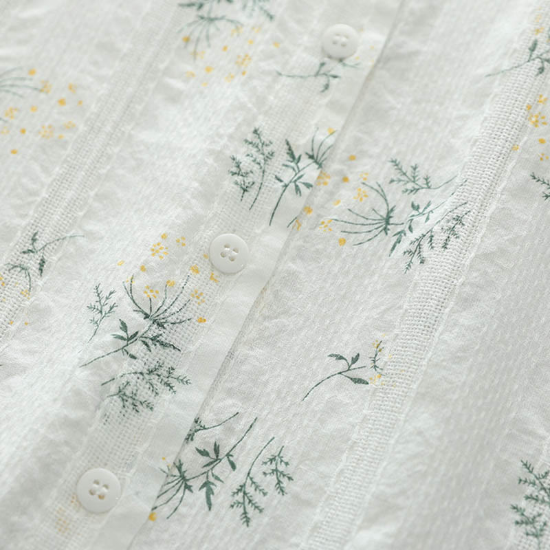 Camisa de manga larga de algodón para mujer con estampado de Buddha Stones, flores blancas y amarillas, hojas verdes y botones. - image 6