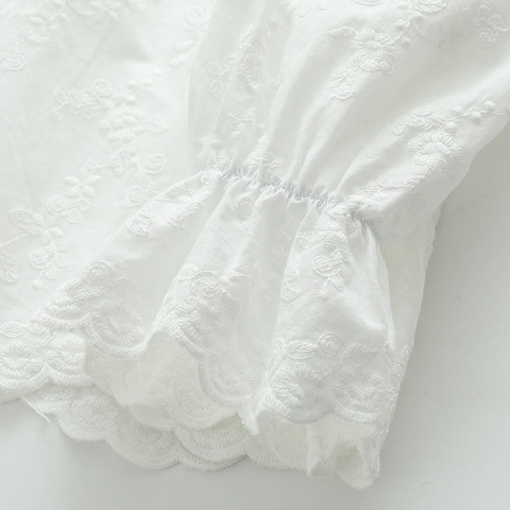 Camisa de manga larga de algodón para mujer con bordado floral blanco otoñal de Buddha Stones y cuello Peter Pan con botones. - image 9