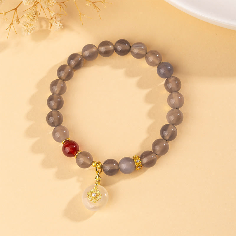 Pulsera de equilibrio con Buddha Stones, ágata gris, ágata roja y calcedonia. - image 2