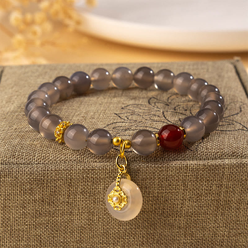 Pulsera de equilibrio con Buddha Stones, ágata gris, ágata roja y calcedonia. - Ágata gris (circunferencia de la muñeca: 15-16 cm) - image 0