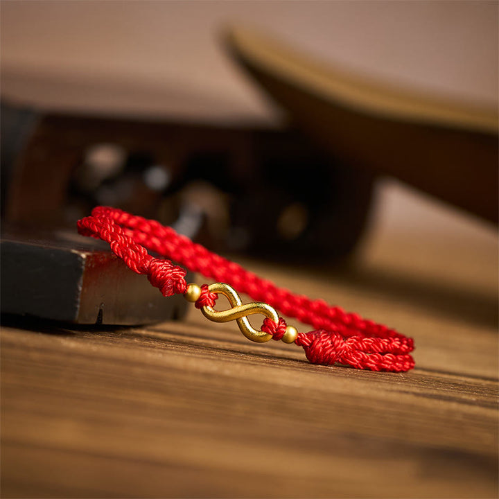 Buddha Stones Pulsera protectora ajustable de latón con cordón rojo y dije de infinito - image 2