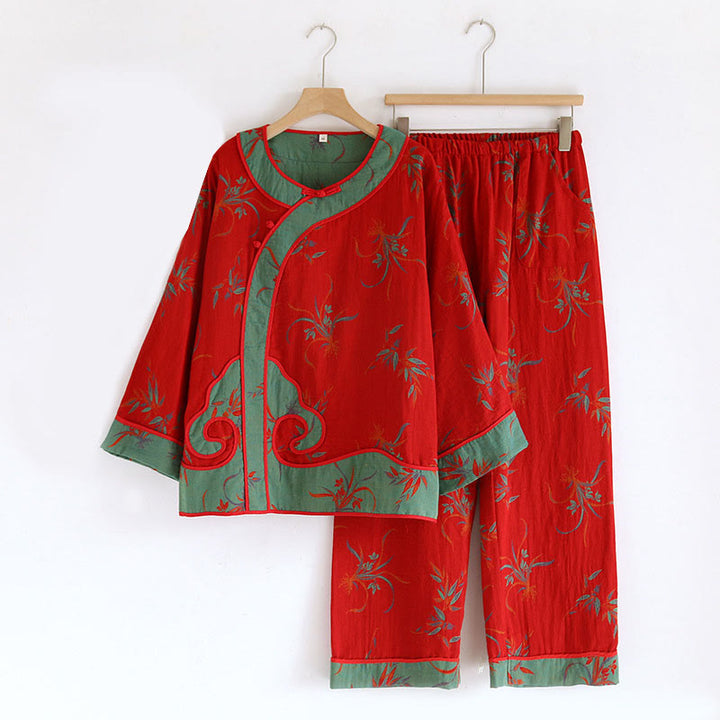 Conjunto de camisa y pantalón de manga larga con botones de rana y bolsillos, estilo patchwork, de algodón puro, con estampado de Buddha Stones (2 piezas).  - Patrón de orquídea roja - US6，UK/AU10，EU38 (XL) - image 0