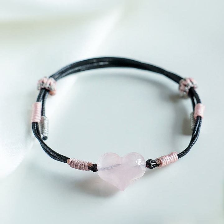 Pulsera cálida de hilo trenzado con cristales rosas y dijes de corazón natural de Buddha Stones - image 7