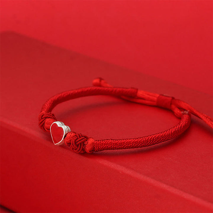 Pulsera de plata de ley 999 con diseño de corazón 3D y cordón rojo con Buddha Stones - image 1