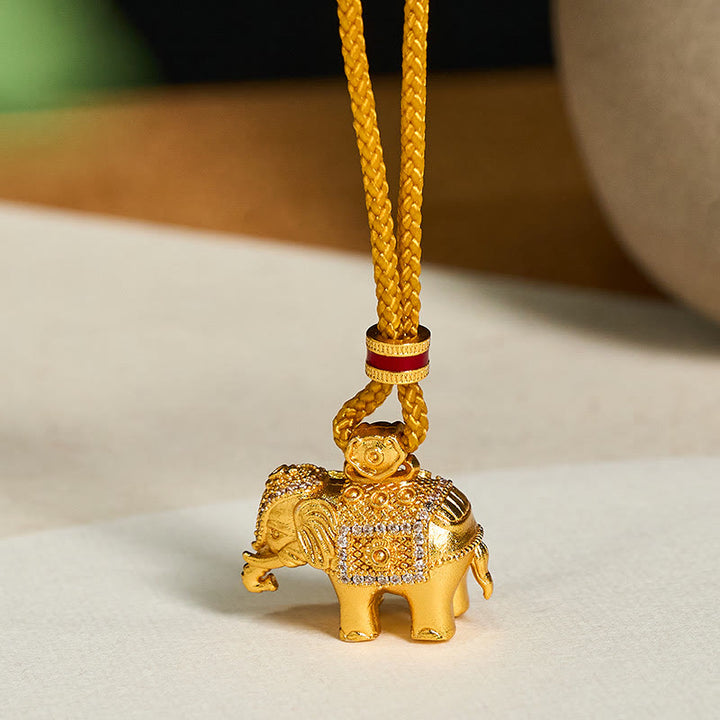 Collar con colgante de cuerda de fuerza con dije de elefante de latón chapado en oro de 24 Buddha Stones - image 1