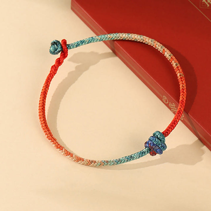 Pulsera de fuerza con nudos tejidos a mano con Buddha Stones de colores - image 1
