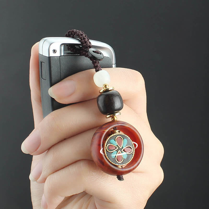 Llavero giratorio con Buddha Stones, madera de ébano, trébol de cuatro hojas en sánscrito, ojo de Buda y paz. - image 10