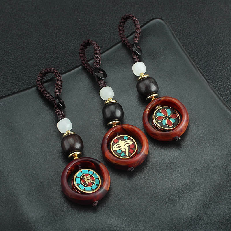 Llavero giratorio con Buddha Stones, madera de ébano, trébol de cuatro hojas en sánscrito, ojo de Buda y paz. - image 13