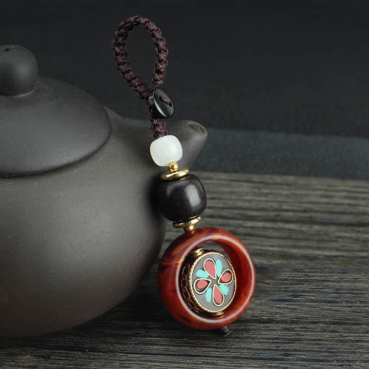 Llavero giratorio con Buddha Stones, madera de ébano, trébol de cuatro hojas en sánscrito, ojo de Buda y paz. - Patrón de trébol de cuatro hojas - image 8