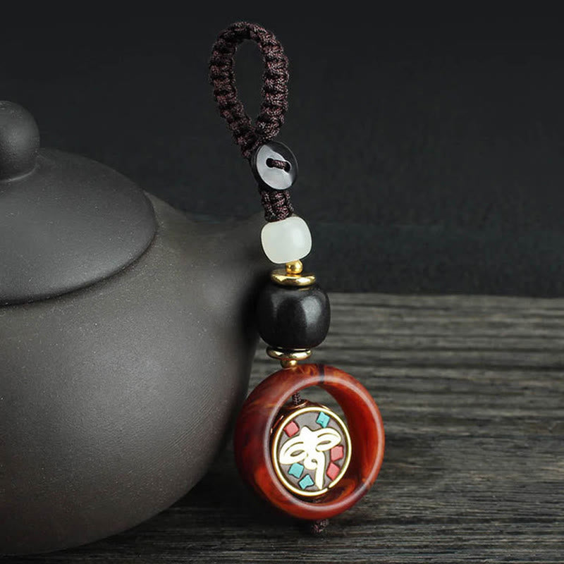 Llavero giratorio con Buddha Stones, madera de ébano, trébol de cuatro hojas en sánscrito, ojo de Buda y paz. - Patrón de ojo de Buda - image 6