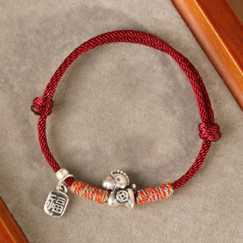 Pulsera trenzada con Buddha Stones en plata de ley 999 con el personaje Fu del Año del Caballo. - image 0