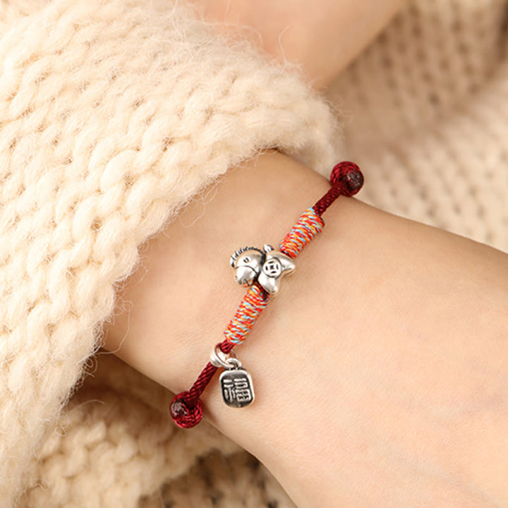 Pulsera trenzada con Buddha Stones en plata de ley 999 con el personaje Fu del Año del Caballo. - image 9