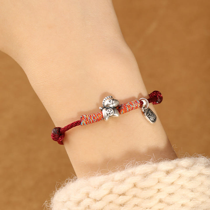 Pulsera trenzada con Buddha Stones en plata de ley 999 con el personaje Fu del Año del Caballo. - image 10