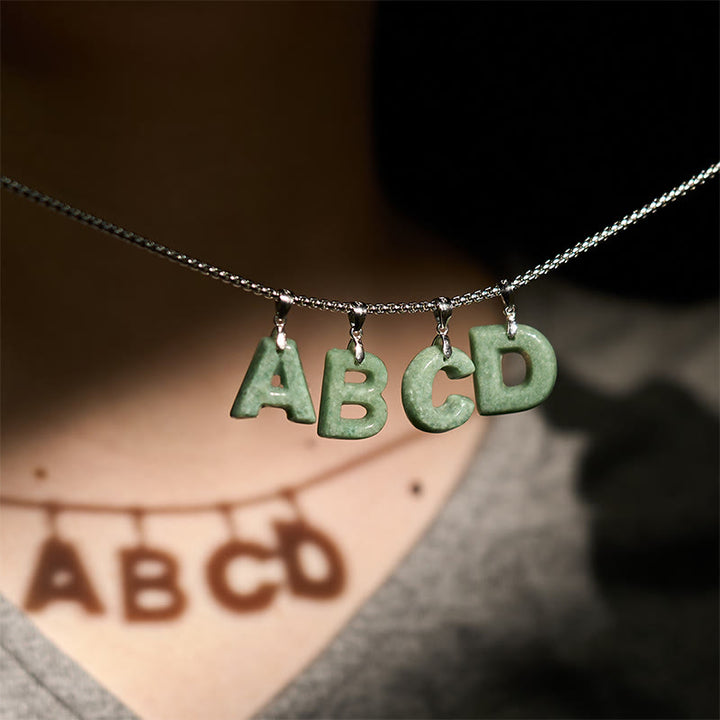 Collar con colgante de prosperidad de cadena ancha de acero de titanio y jade con letras AZ naturales de Buddha Stones - image 41