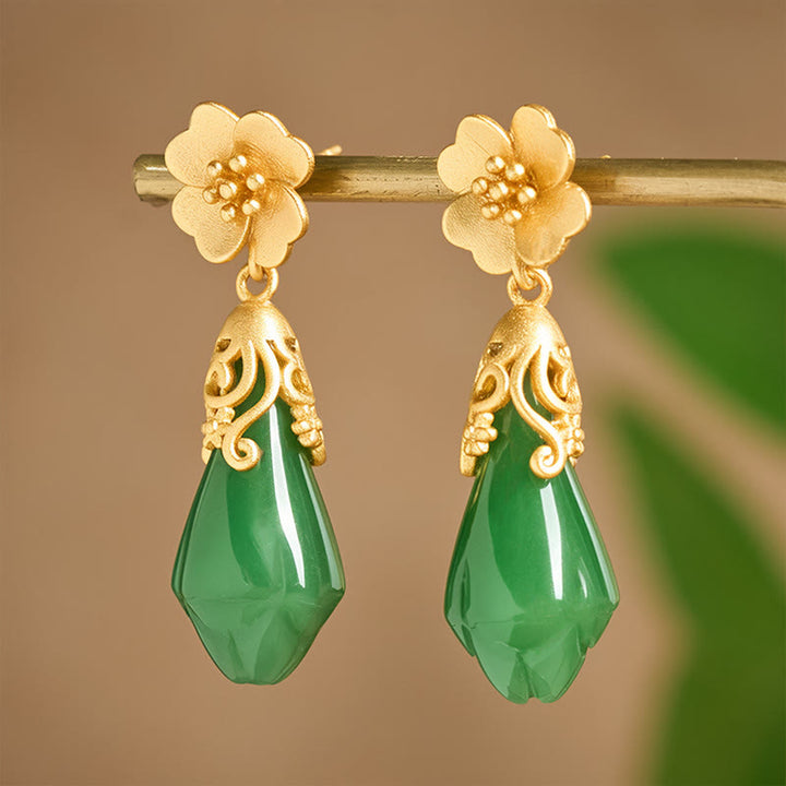 Pendientes de equilibrio de oro y cobre con jaspe verde, flor de magnolia y Buddha Stones - image 3