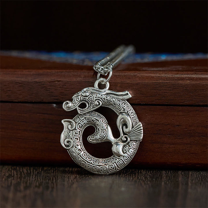 Colgante de plata bañada en cobre con diseño de Taotie de dragón tibetano en espiral con Buddha Stones - image 1