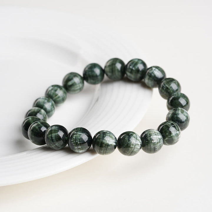 Pulsera de cuentas redondas de serafinita natural de Buddha Stones para el equilibrio emocional - image 2