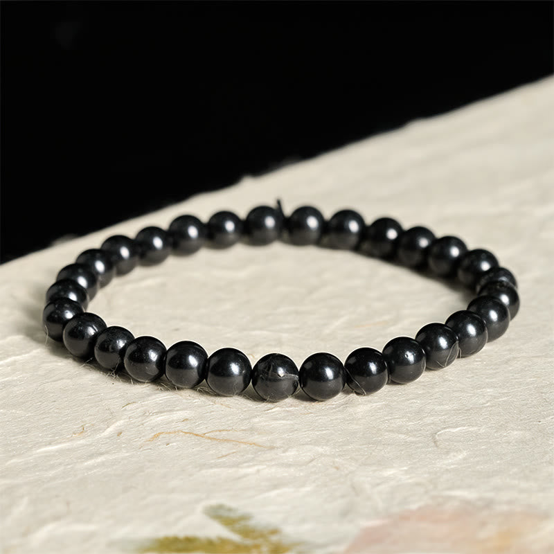 Pulsera de cuentas de shungita auténtica y redonda con Buddha Stones y fuerza interior - image 0