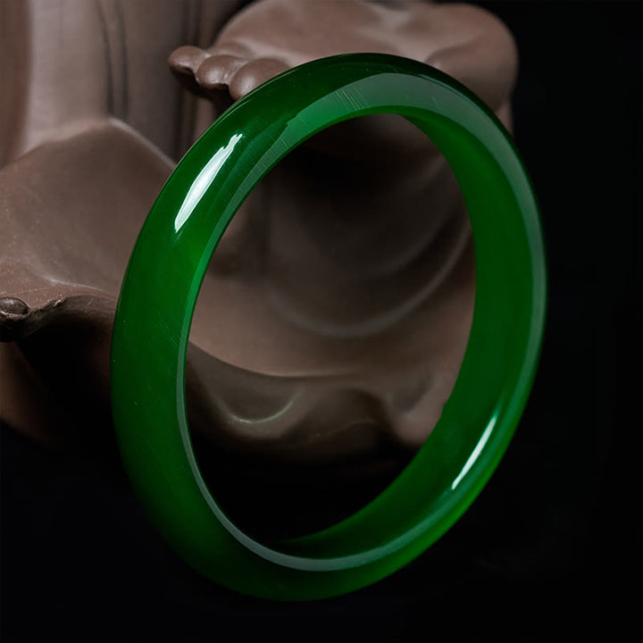 Pulsera fina con Buddha Stones y ojo de gato verde que alivia el estrés y la riqueza. - image 1