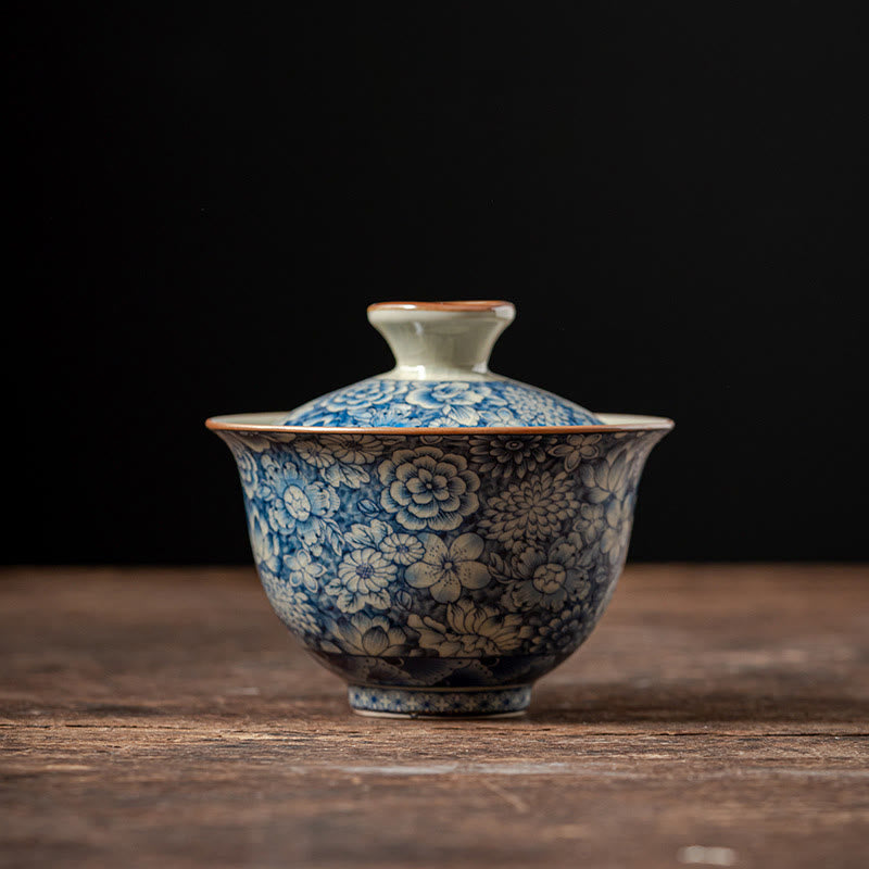 Buddha Stones azul y blanca vintage Flor de durazno Loto Peonía Cerámica Gaiwan Sancai Taza de té Kung Fu Taza de té y platillo con tapa