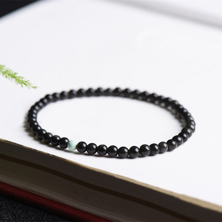 Pulsera de Obsidiana Negra y Turquesa con Buddha Stones para la Fuerza - image 3