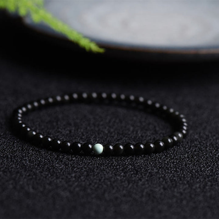 Pulsera de Obsidiana Negra y Turquesa con Buddha Stones para la Fuerza - Obsidiana negra turquesa (circunferencia de la muñeca: 14-15 cm) - image 0