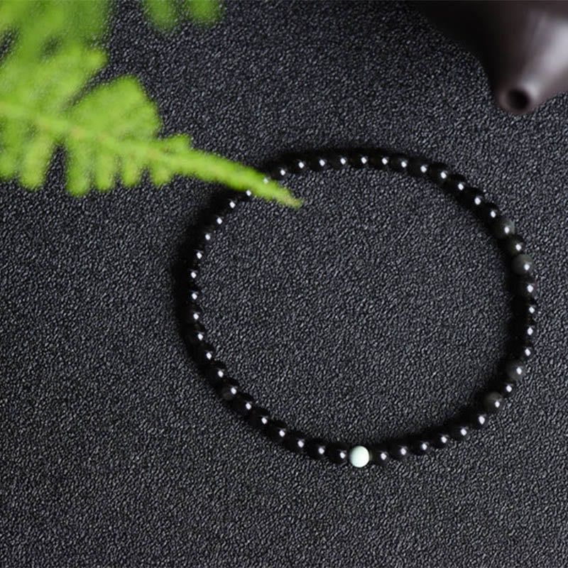 Pulsera de Obsidiana Negra y Turquesa con Buddha Stones para la Fuerza - image 1