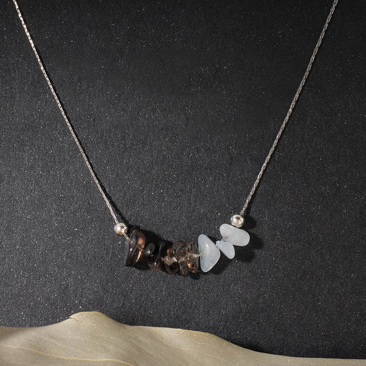 Collar con colgante de fuerza de cristal rosa, cuarzo fresa, granate, aguamarina y obsidiana negra de Buddha Stones - Obsidiana negra, cuarzo ahumado, aguamarina - image 0