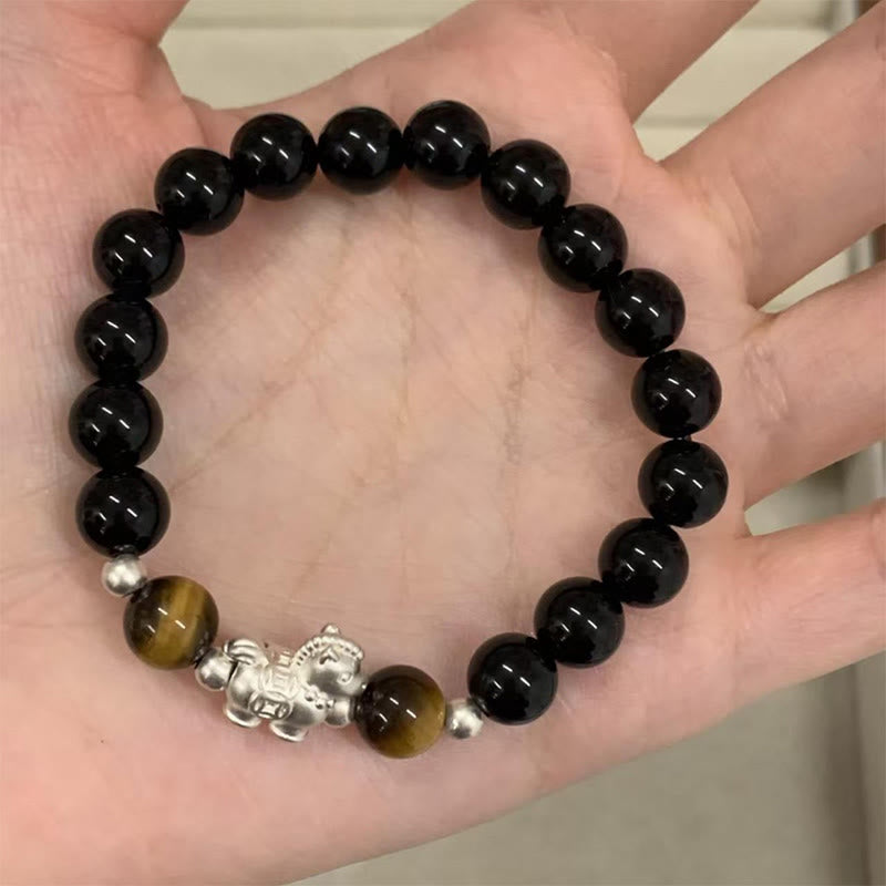 Pulsera de fuerza con dije de caballo de obsidiana negra y ojo de tigre en plata de ley 999 con Buddha Stones y año del caballo - 10 mm - image 0