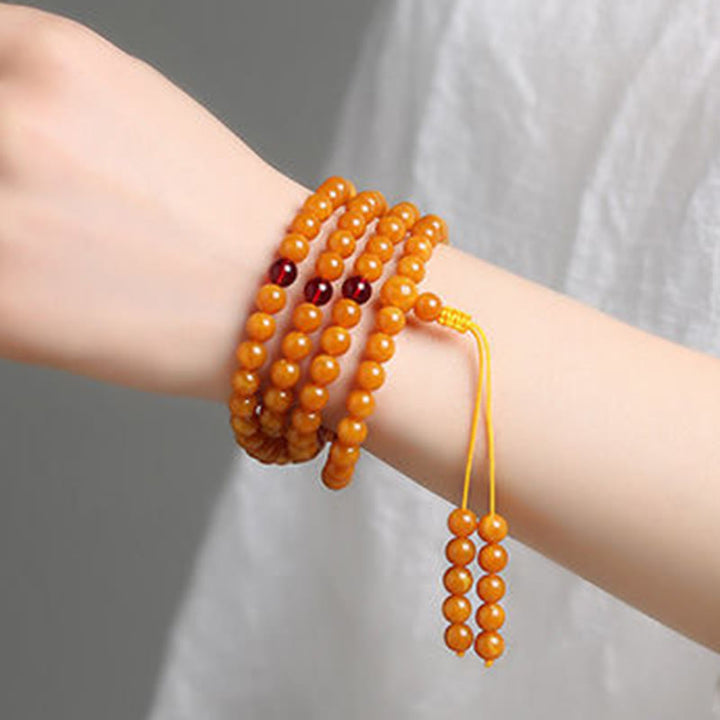 Mala de cuentas redondas de ámbar tibetano con Buddha Stones - image 8