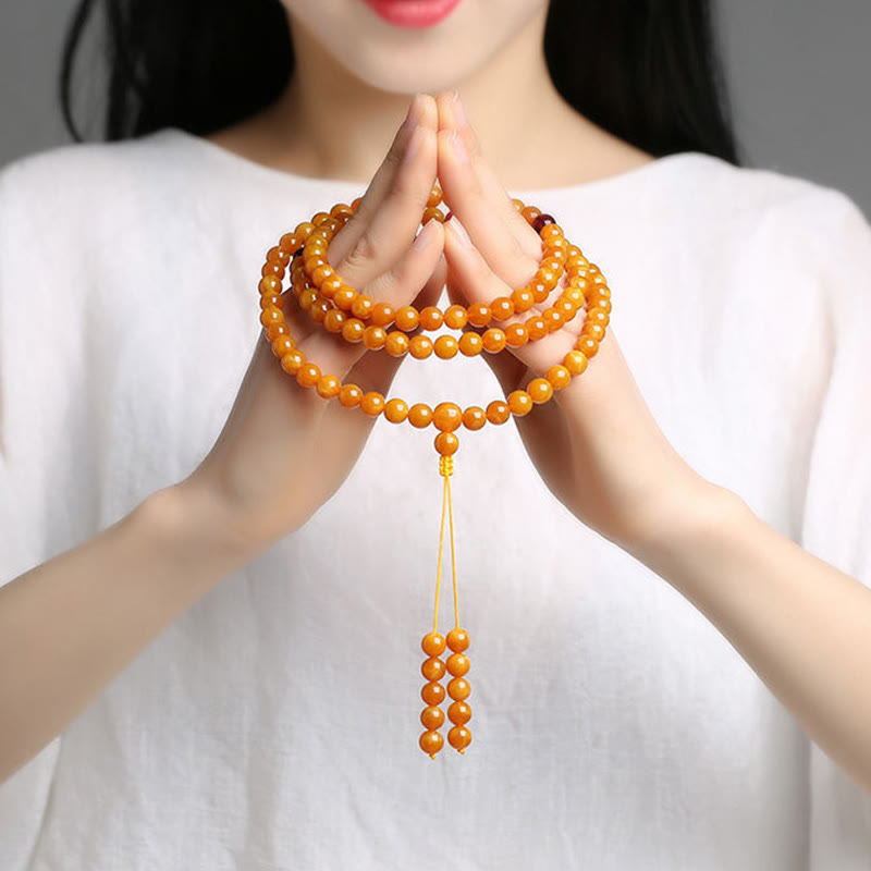Mala de cuentas redondas de ámbar tibetano con Buddha Stones - image 9