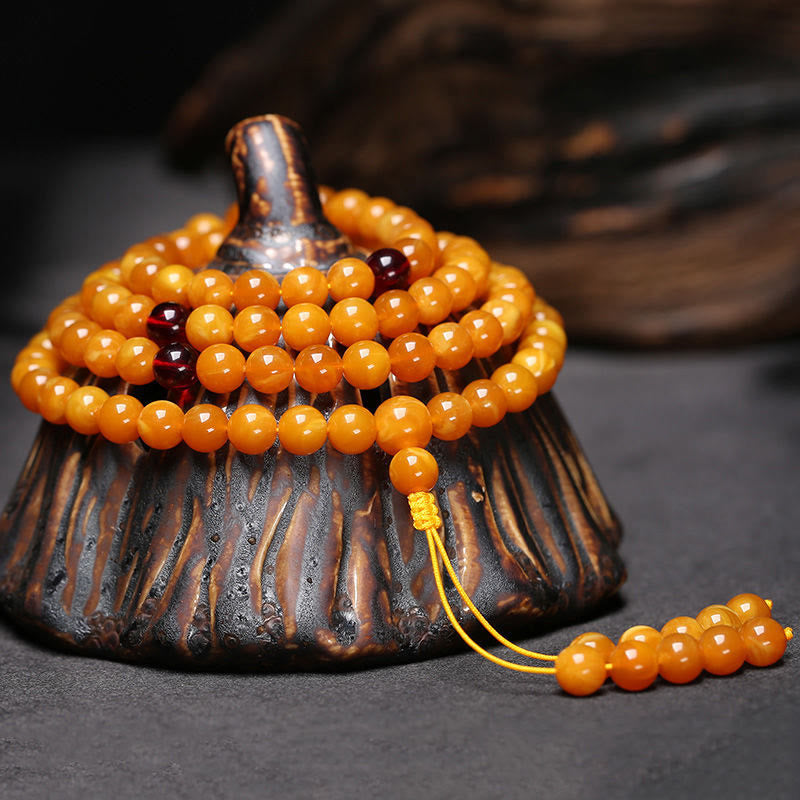Mala de cuentas redondas de ámbar tibetano con Buddha Stones - image 2