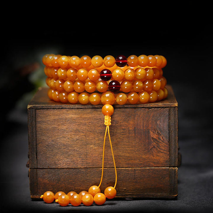 Mala de cuentas redondas de ámbar tibetano con Buddha Stones - image 6