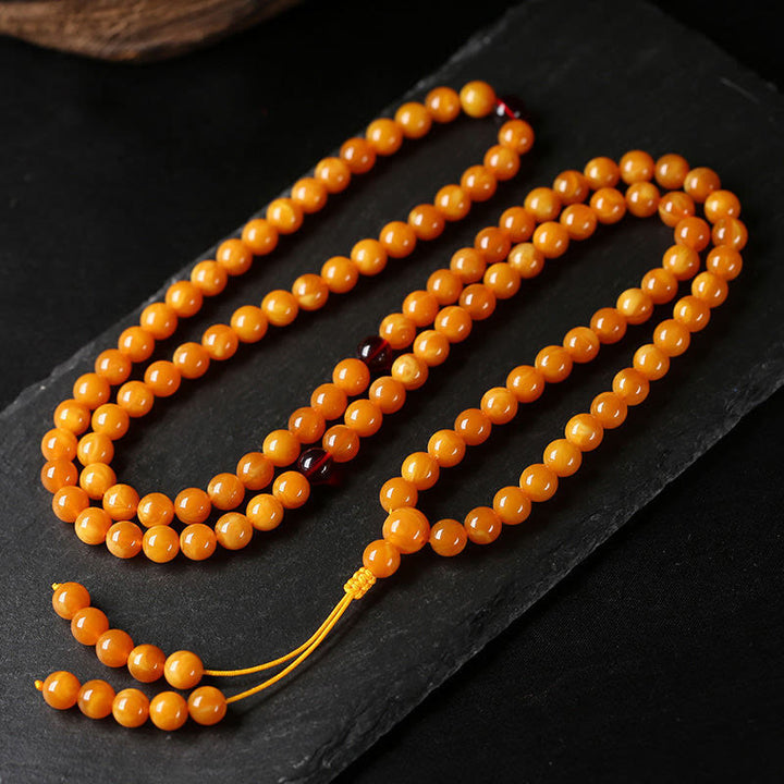 Mala de cuentas redondas de ámbar tibetano con Buddha Stones - image 4