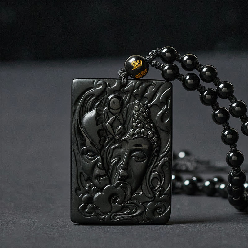Collar con colgante de obsidiana negra con diseño de Buddha Stones, mitad demonio, mitad Buda en relieve - image 1