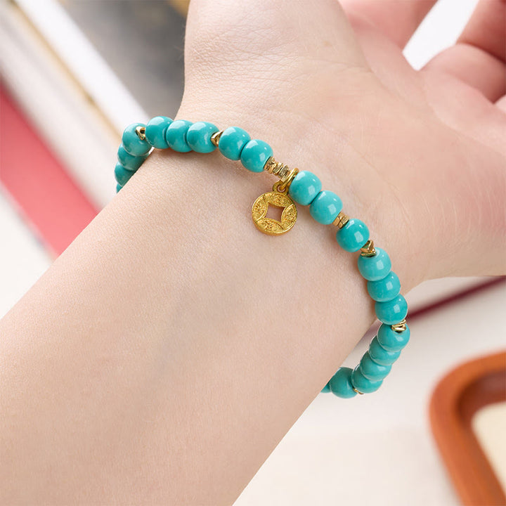Pulsera de turquesa de imitación con dije de monedas de cobre y Buddha Stones - image 2