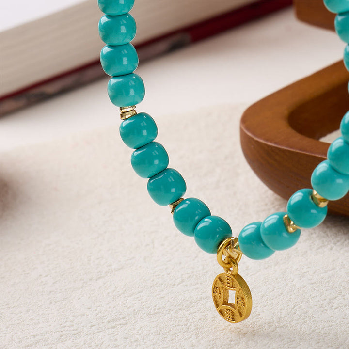 Pulsera de turquesa de imitación con dije de monedas de cobre y Buddha Stones - image 3