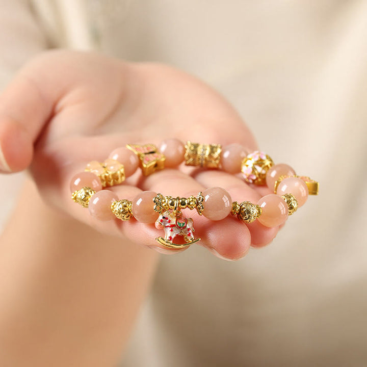 Pulsera de éxito con Buddha Stones, ágata roja del sur, turmalina y piedra solar del Año del Caballo - image 10