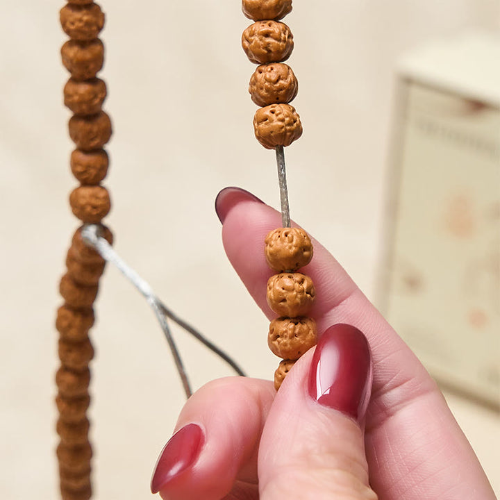 Mala Buddha Stones de 108 cuentas con semillas de Bodhi y riqueza y auspiciosidad - image 5