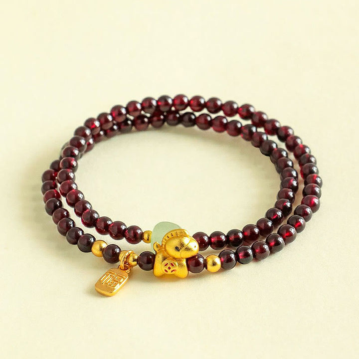Pulsera de doble vuelta con Buddha Stones, año del caballo, granate, jade y carácter Fu. - image 3