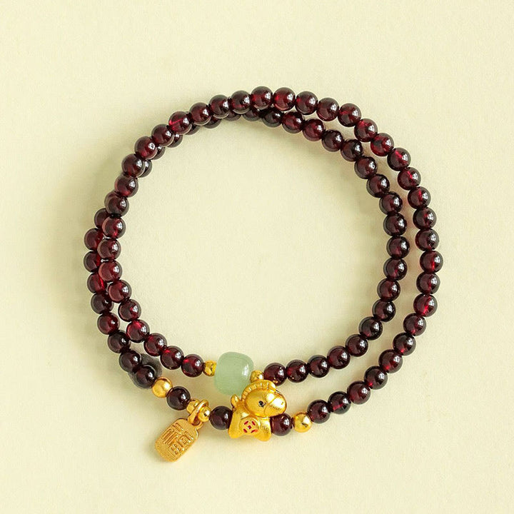 Pulsera de doble vuelta con Buddha Stones, año del caballo, granate, jade y carácter Fu. - image 1