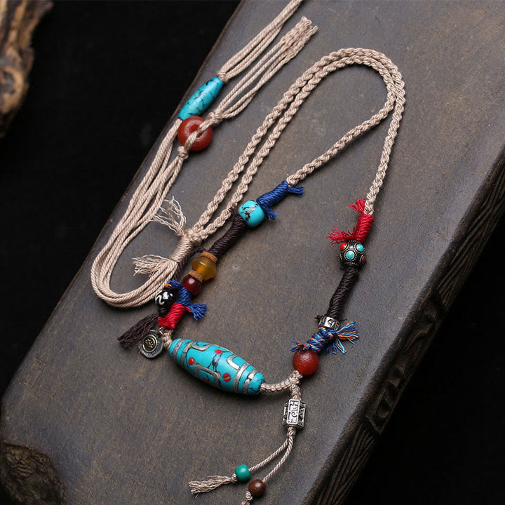 Collar con colgante de cuentas Dzi de cobre y turquesa con Buddha Stones para la suerte - Cuenta Dzi de cobre y turquesa - image 0