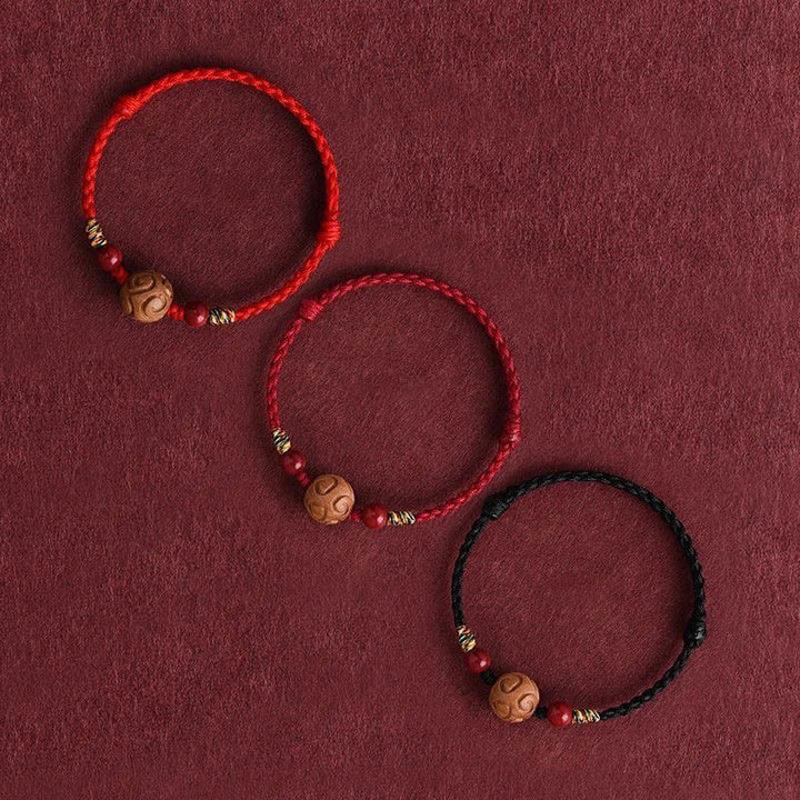 Pulsera de cuerda de madera de melocotón natural con Buddha Stones talladas y patrón auspicioso - image 15