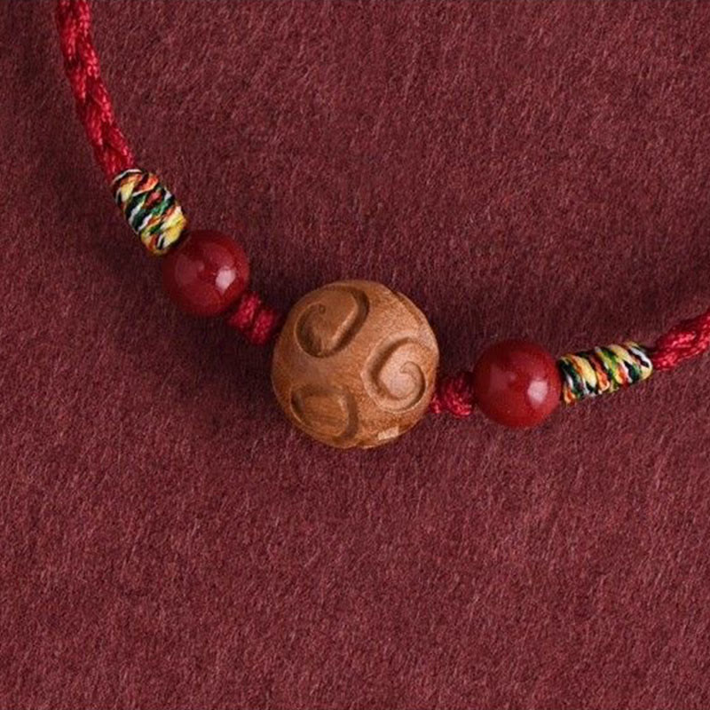 Pulsera de cuerda de madera de melocotón natural con Buddha Stones talladas y patrón auspicioso - image 10