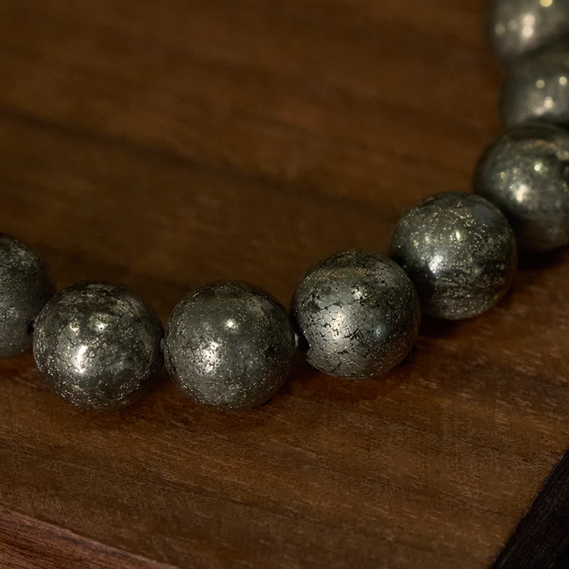 Pulsera de cuentas redondas de pirita y Buddha Stones que promueve la confianza y la abundancia - image 3