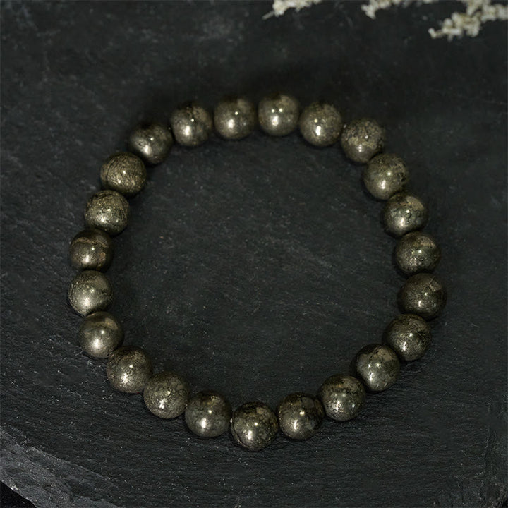 Pulsera de cuentas redondas de pirita y Buddha Stones que promueve la confianza y la abundancia - Pirita (circunferencia de la muñeca: 15-16 cm) - image 0