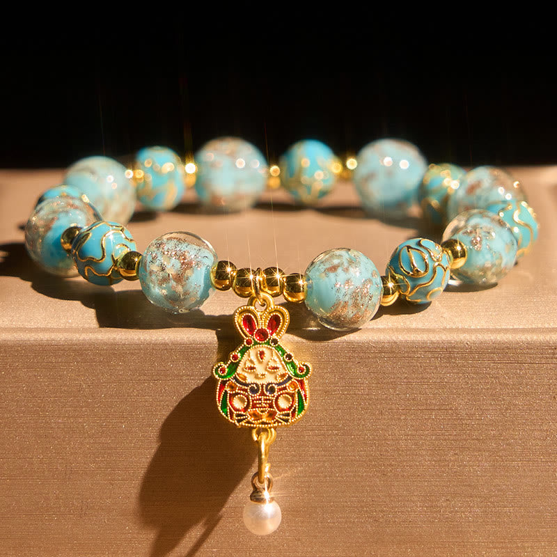 Pulsera de la suerte de cristal Liuli con conejo y Buddha Stones - image 1