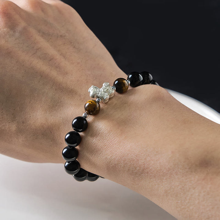 Pulsera de fuerza con dije de caballo de obsidiana negra y ojo de tigre en plata de ley 999 con Buddha Stones y año del caballo - image 4