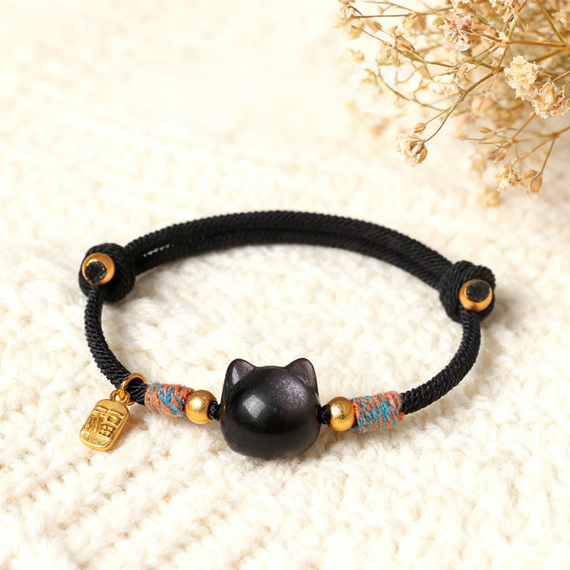 Buddha Stones Pulsera protectora de hilo de cristal rosa obsidiana con brillo plateado y personaje de Cat Fu - Cuerda negra obsidiana con brillo plateado (circunferencia de la muñeca: 15-18 cm) - image 0